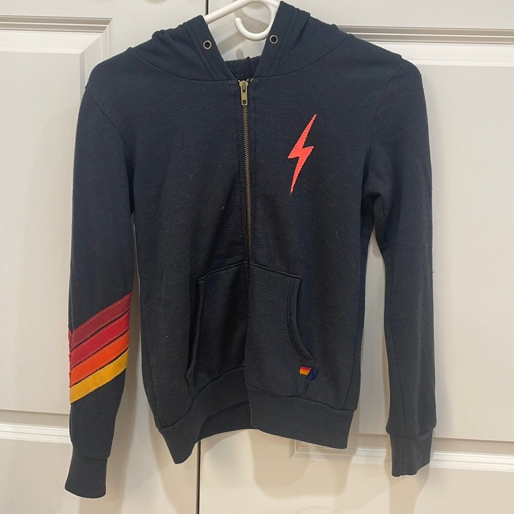 Aviator Nation Black Zip Hoodie with Red Lightning and Multicolor Sleeve Stripes
